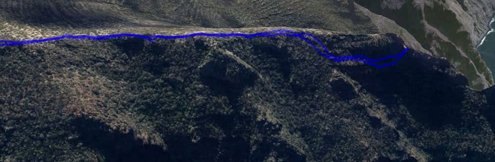 track over the ridge with entrance to the rock gate