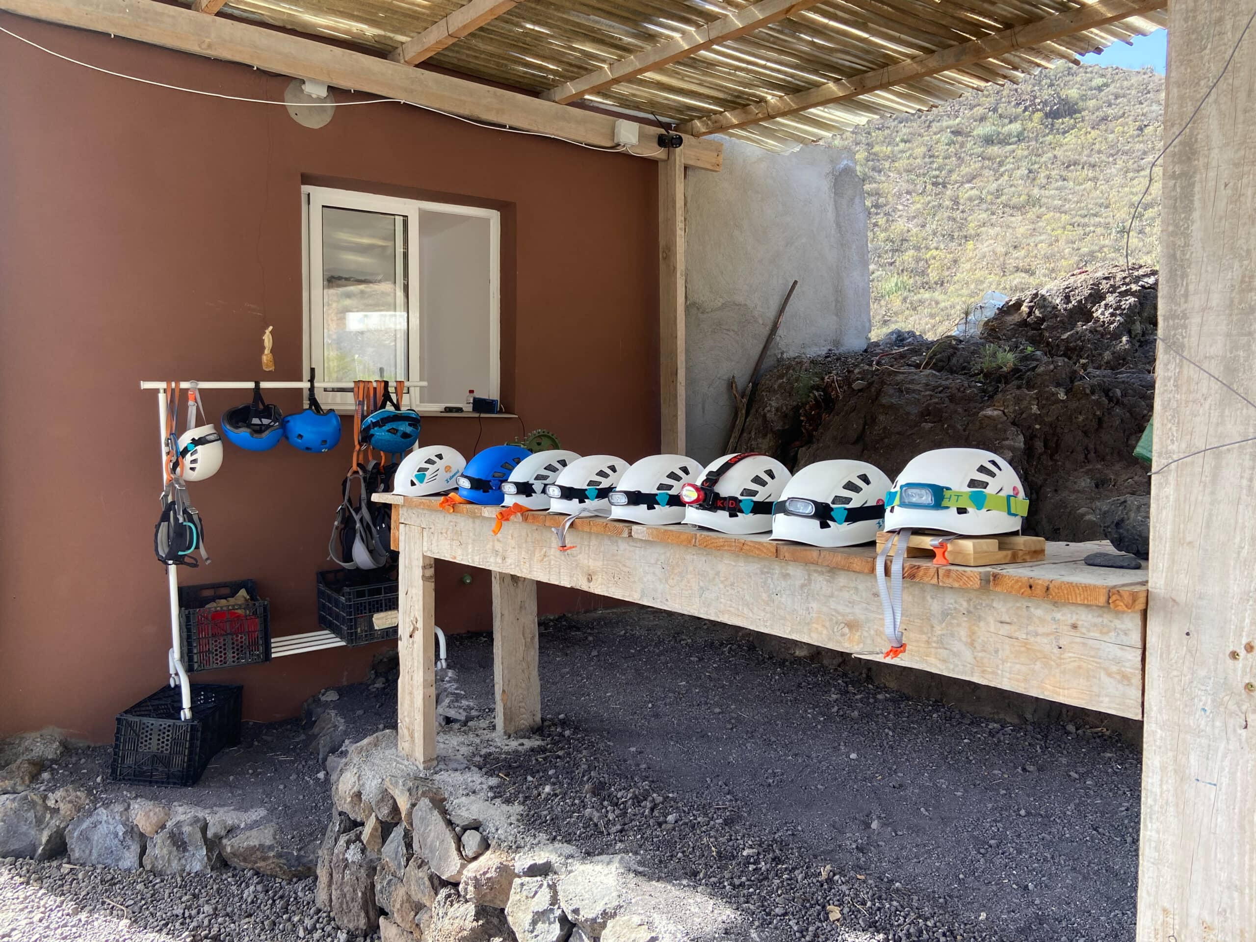 Helmets with headlamps borrowed from the bar operator
