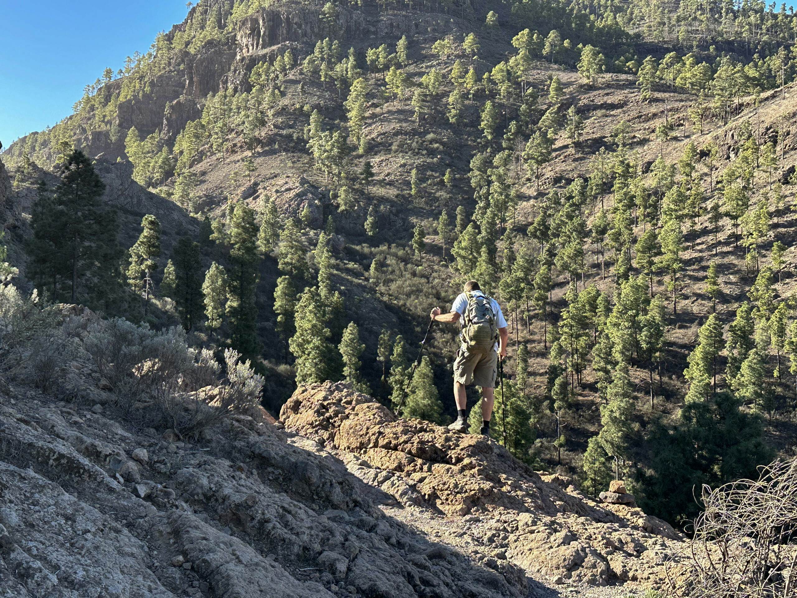 Hikers on the ascent path towards Montaña de Tauro