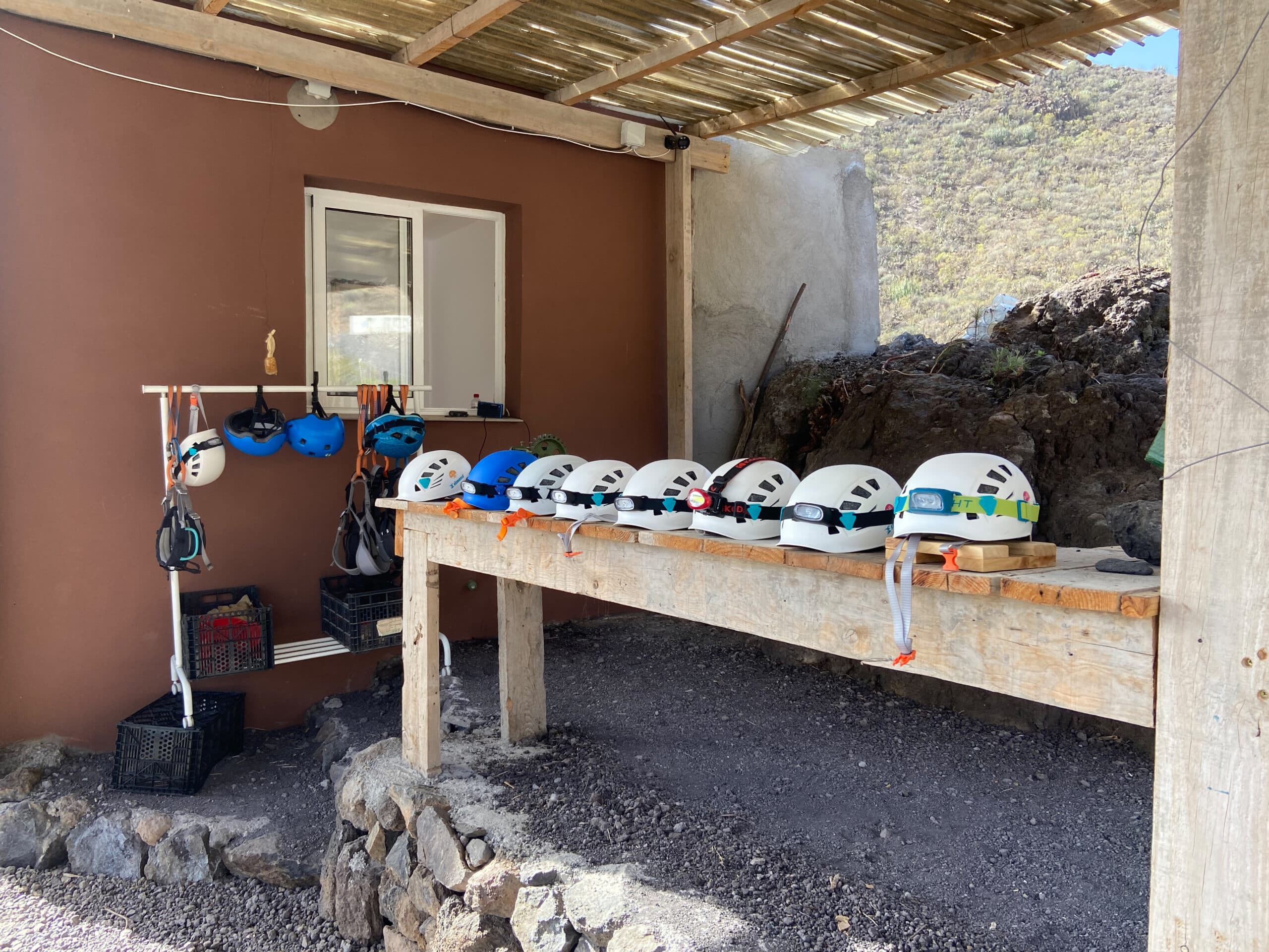 Helmets with headlamps borrowed from the bar operator
