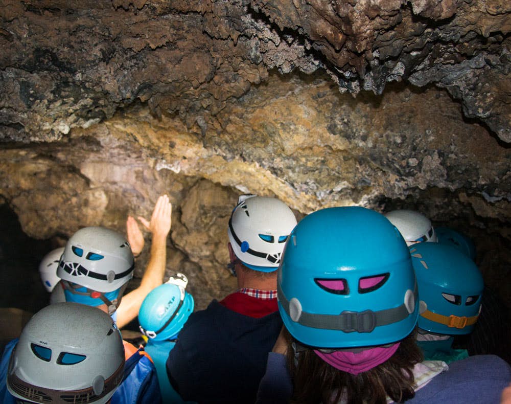 Cueva del Viento - Helmets protect against contact with the ceiling in the cave
