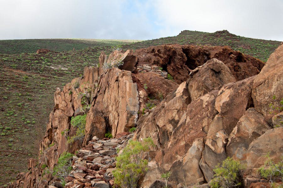 on stony narrow hiking trails uphill