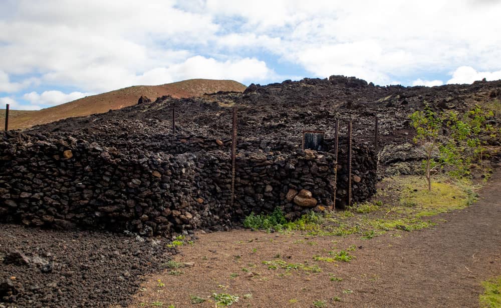 stone goat stables at the foot of Montaña Blanca