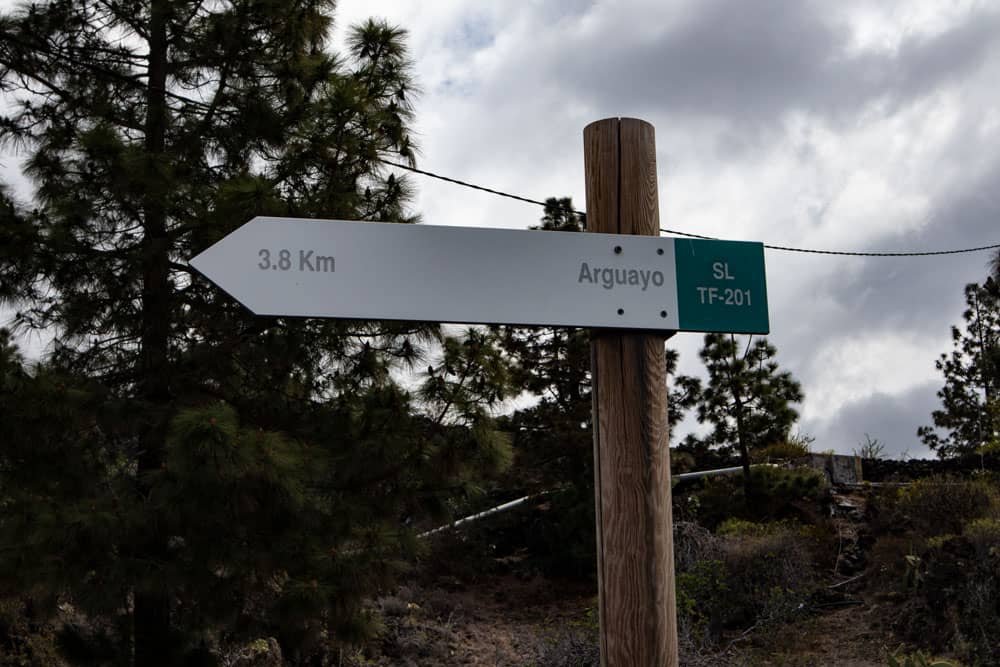 signpost to Arguayo