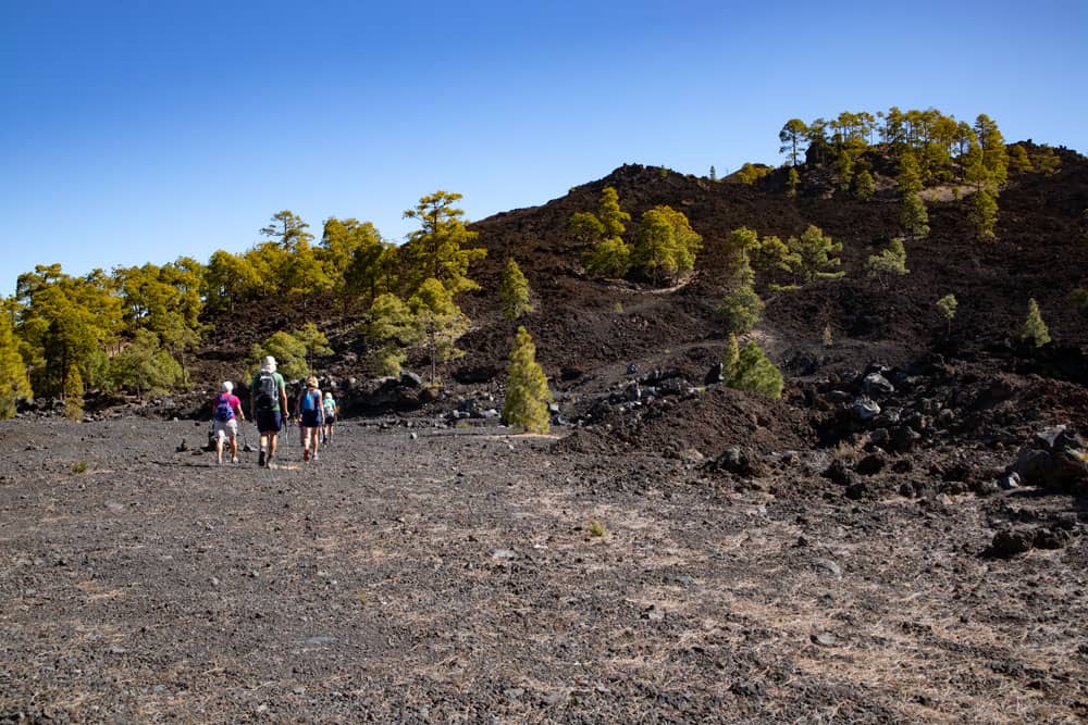 Hikers on the way around the Montaña Cascaja