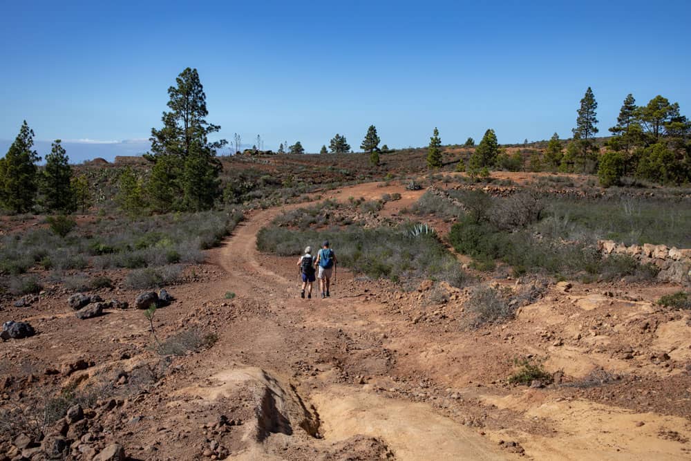 Hiking trail over a wide driveway back to La Quinta