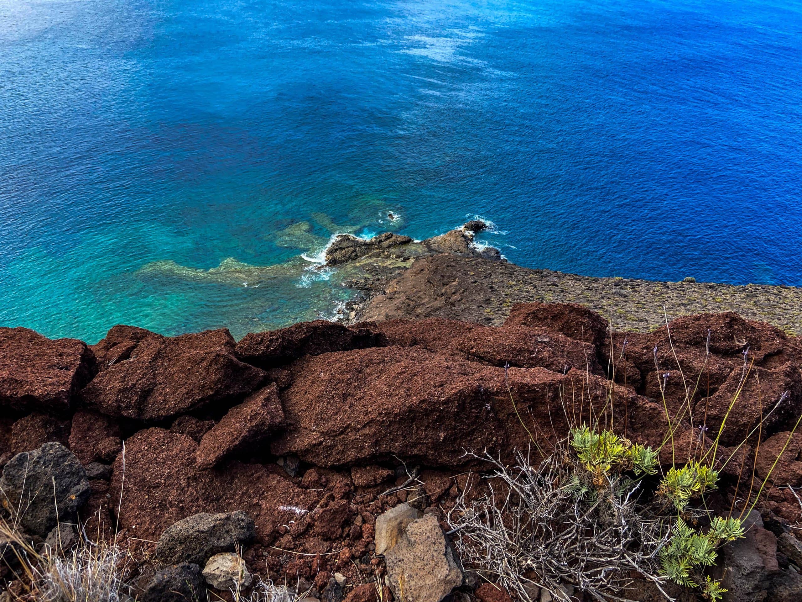 View from the cliff edge down into the sea