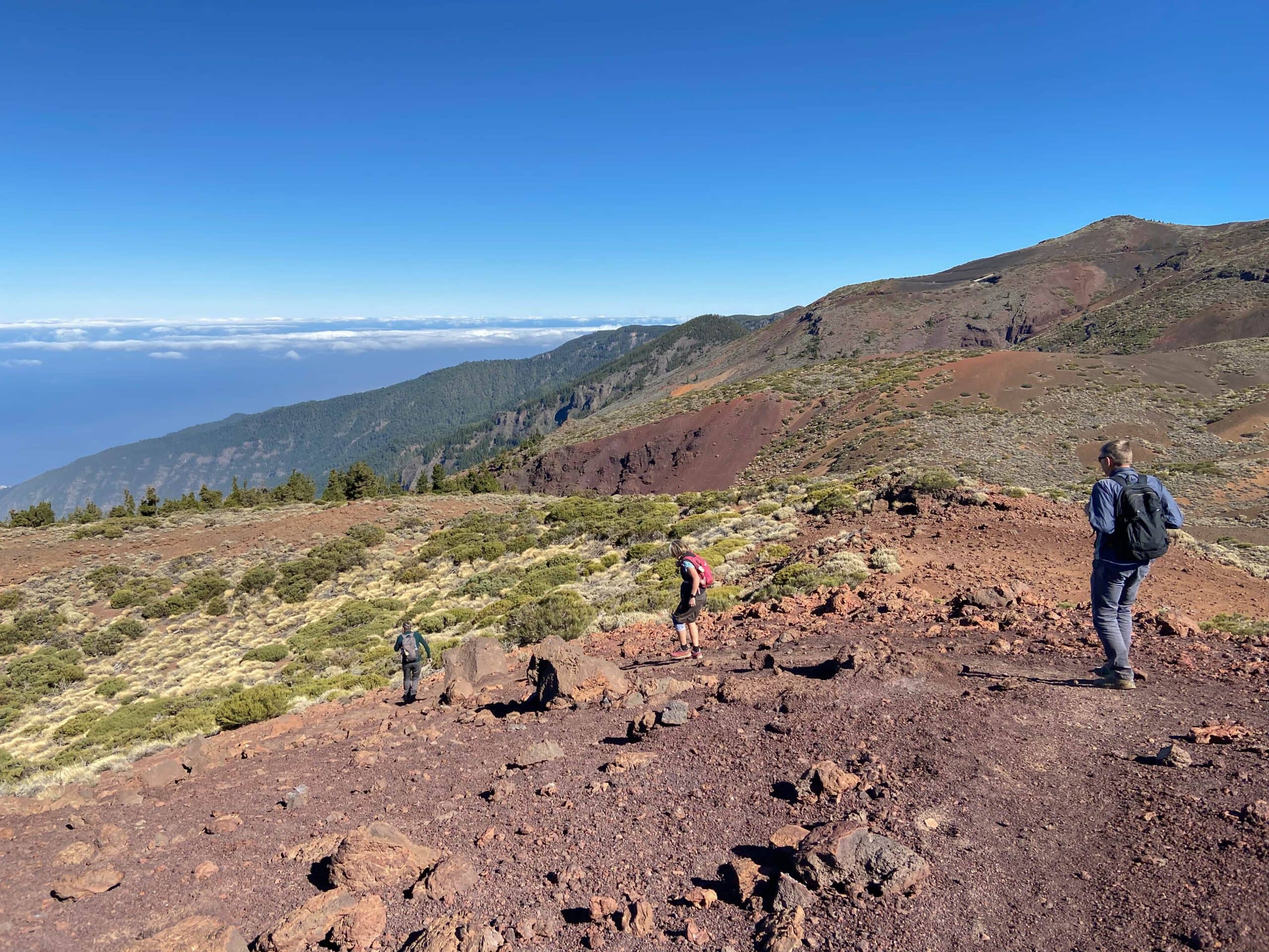 Hikers on the descent path Montaña Limón to the offshore peak