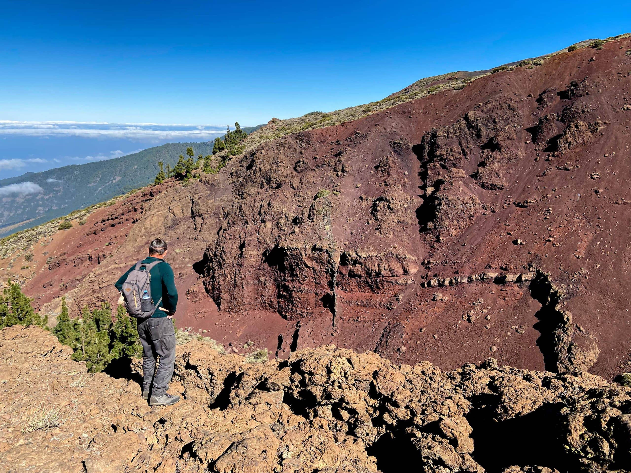 Hiker on the edge of the large Barranco Pedro de Gil