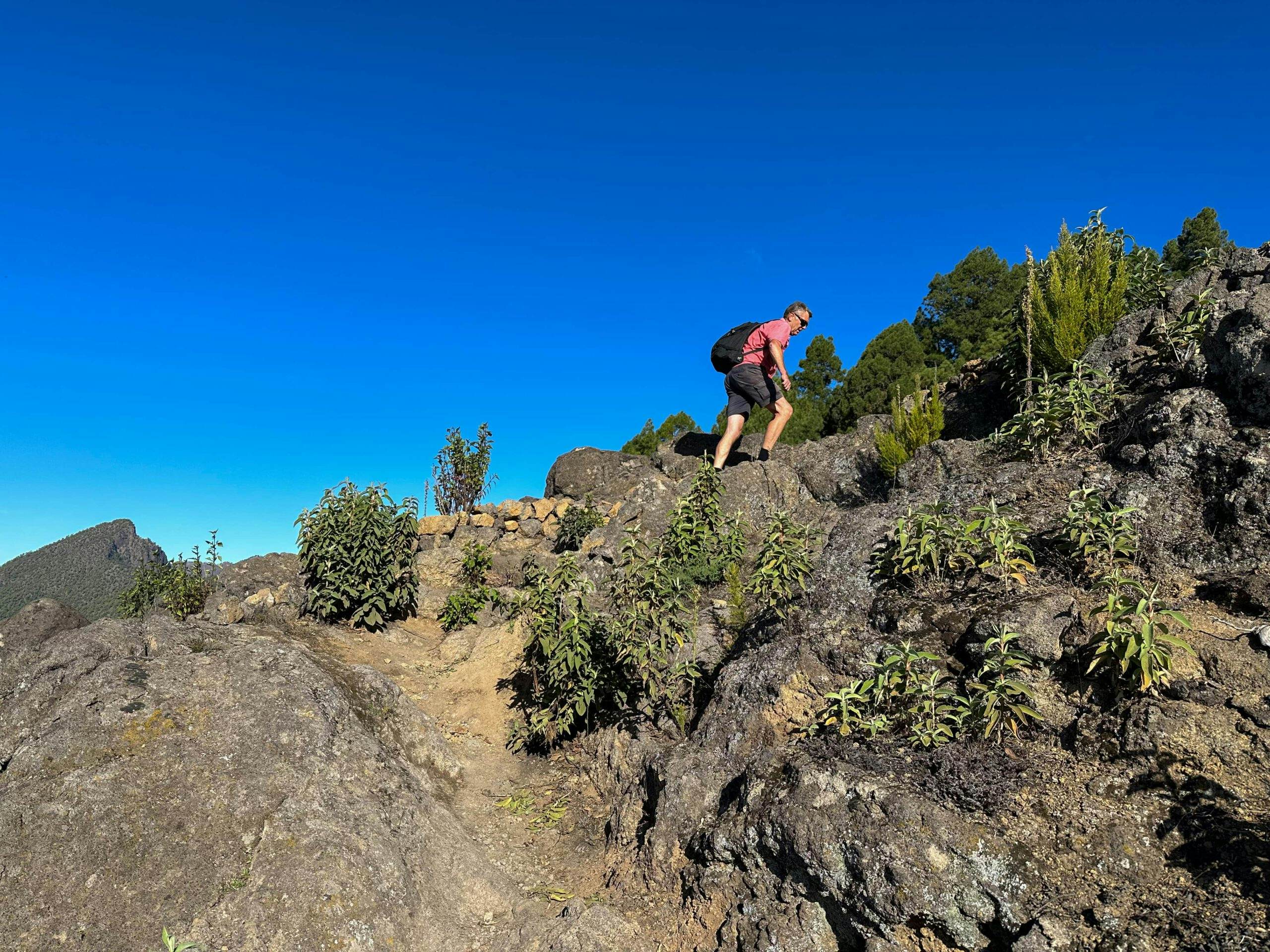 Hiker on the path on the Cumbre