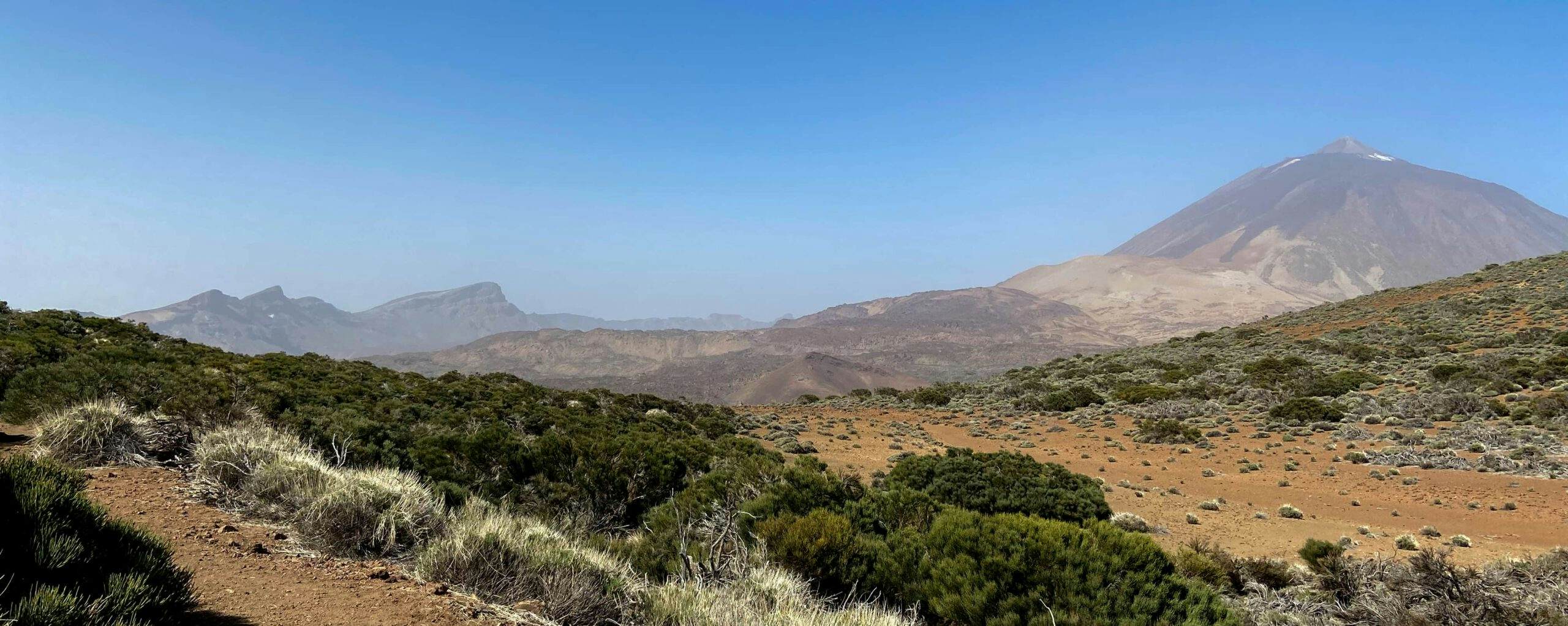 View from the ascent path Montaña de las Arenas Negras to Teide and the Cañadas
