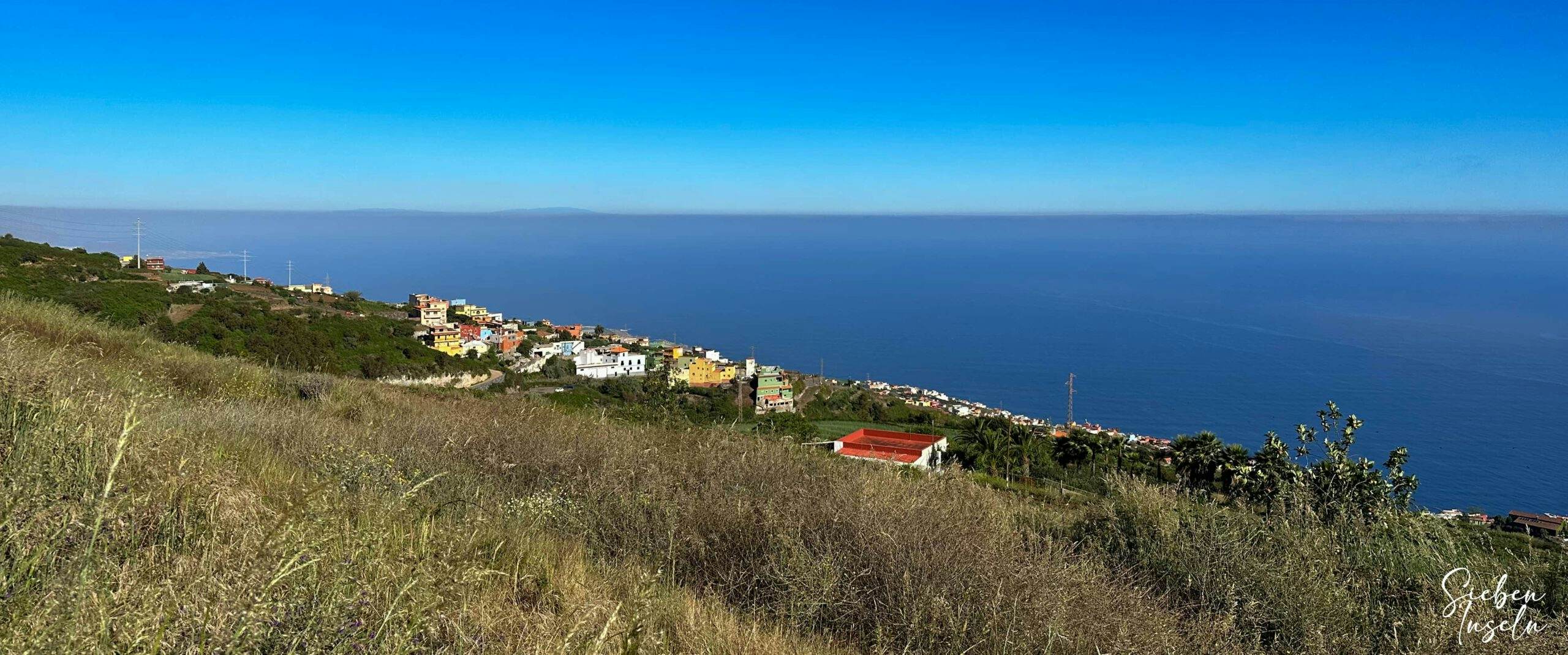 View from the hiking trail behind the Mirador de La Corona to the coast and La Palma