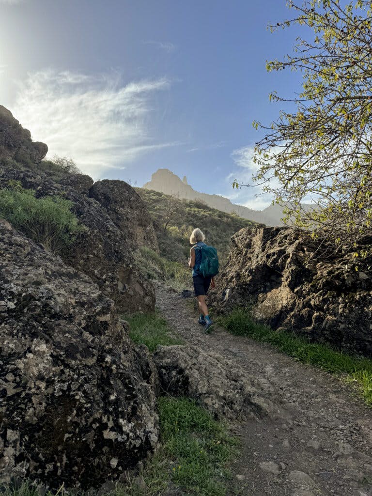 Hiker on the ascent path to Cruz de Tejeda