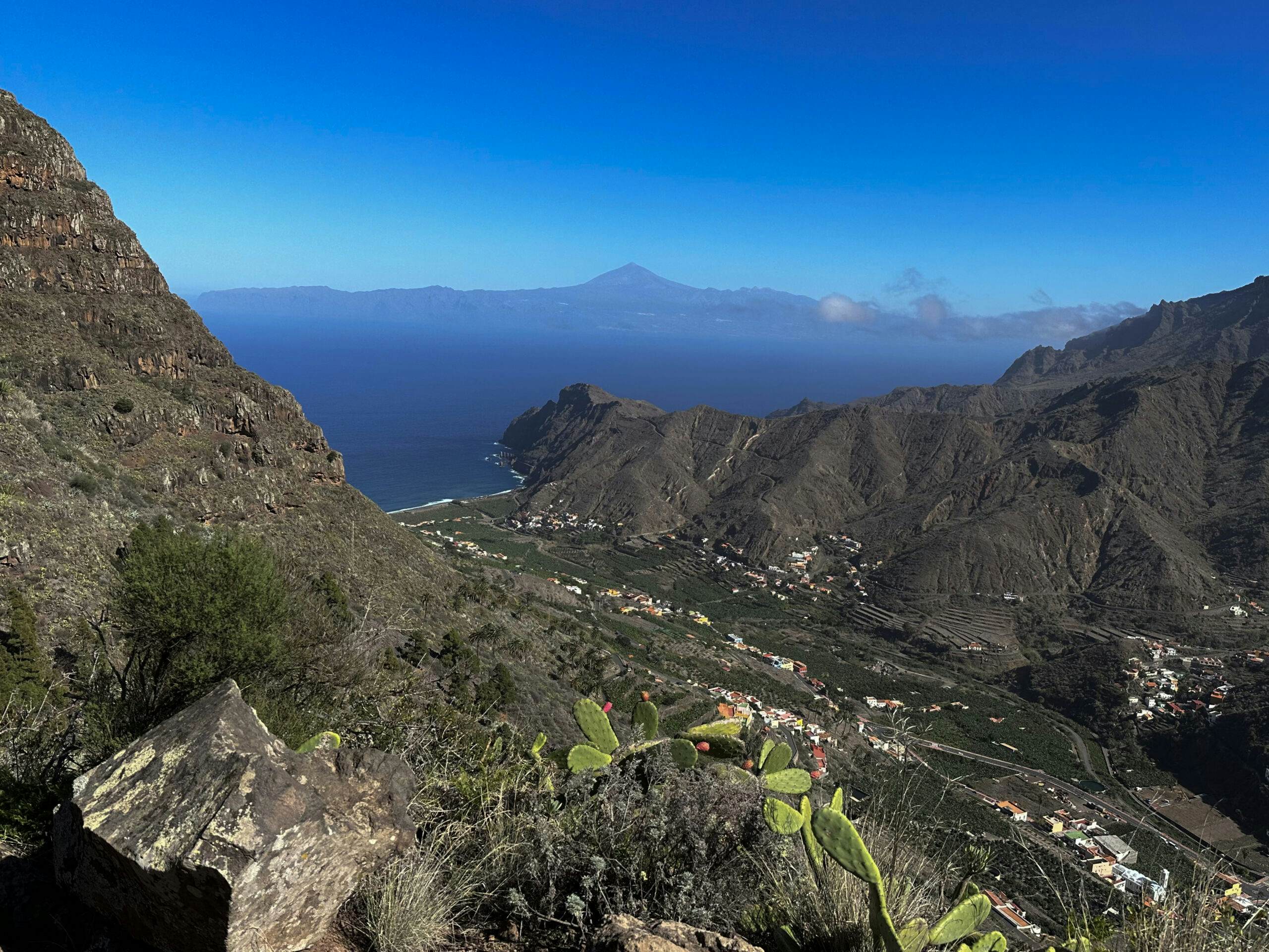 View of Hermigua and Tenerife with Teide in the background from the descent path
